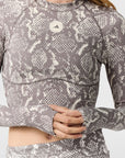 Almond Milk and Charcoal Snake Print TruePurpose Training Long Sleeve Cropped Top