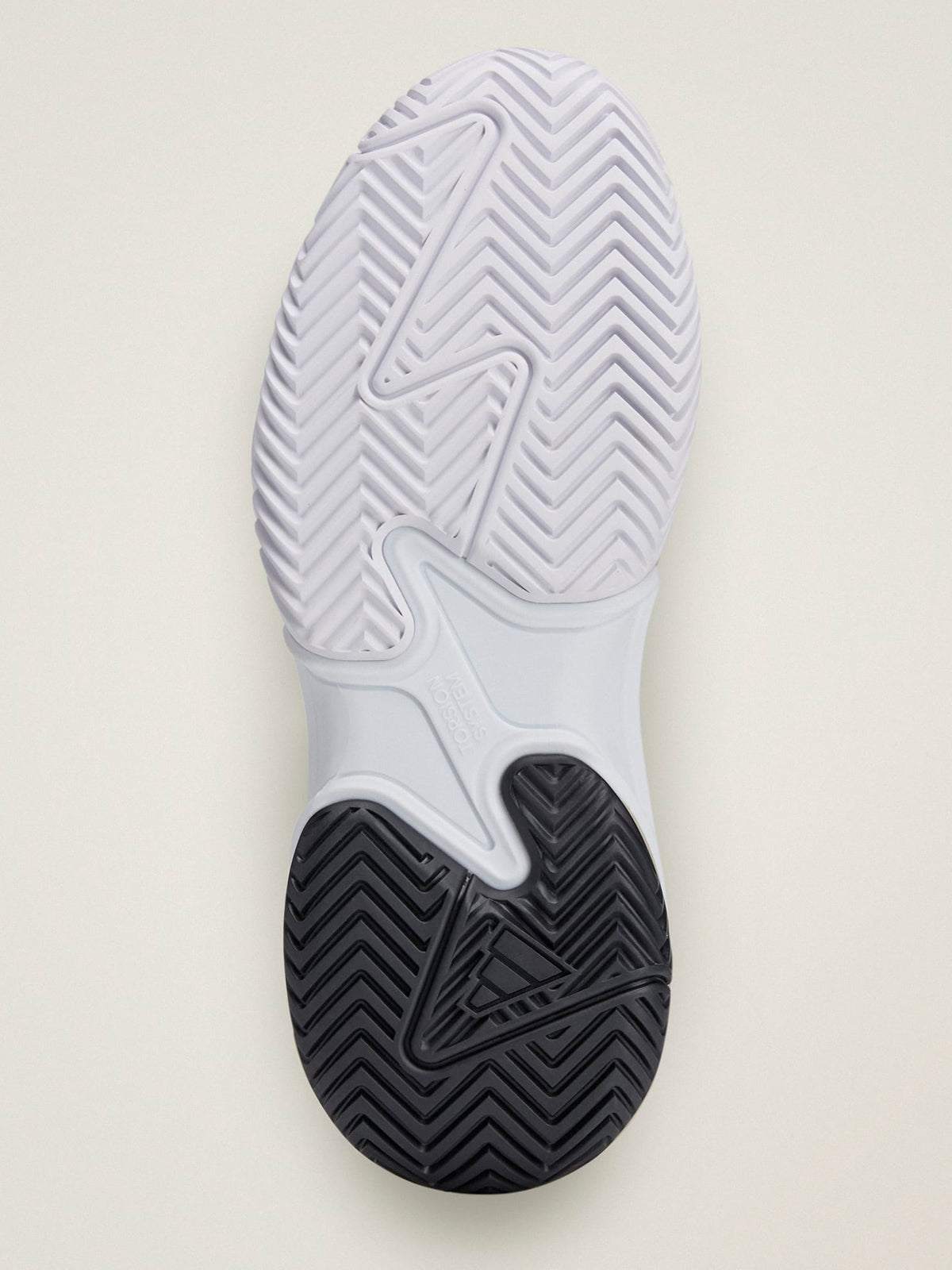 Core Black, Almond Milk and Metallic Silver Barricade Tennis Shoes