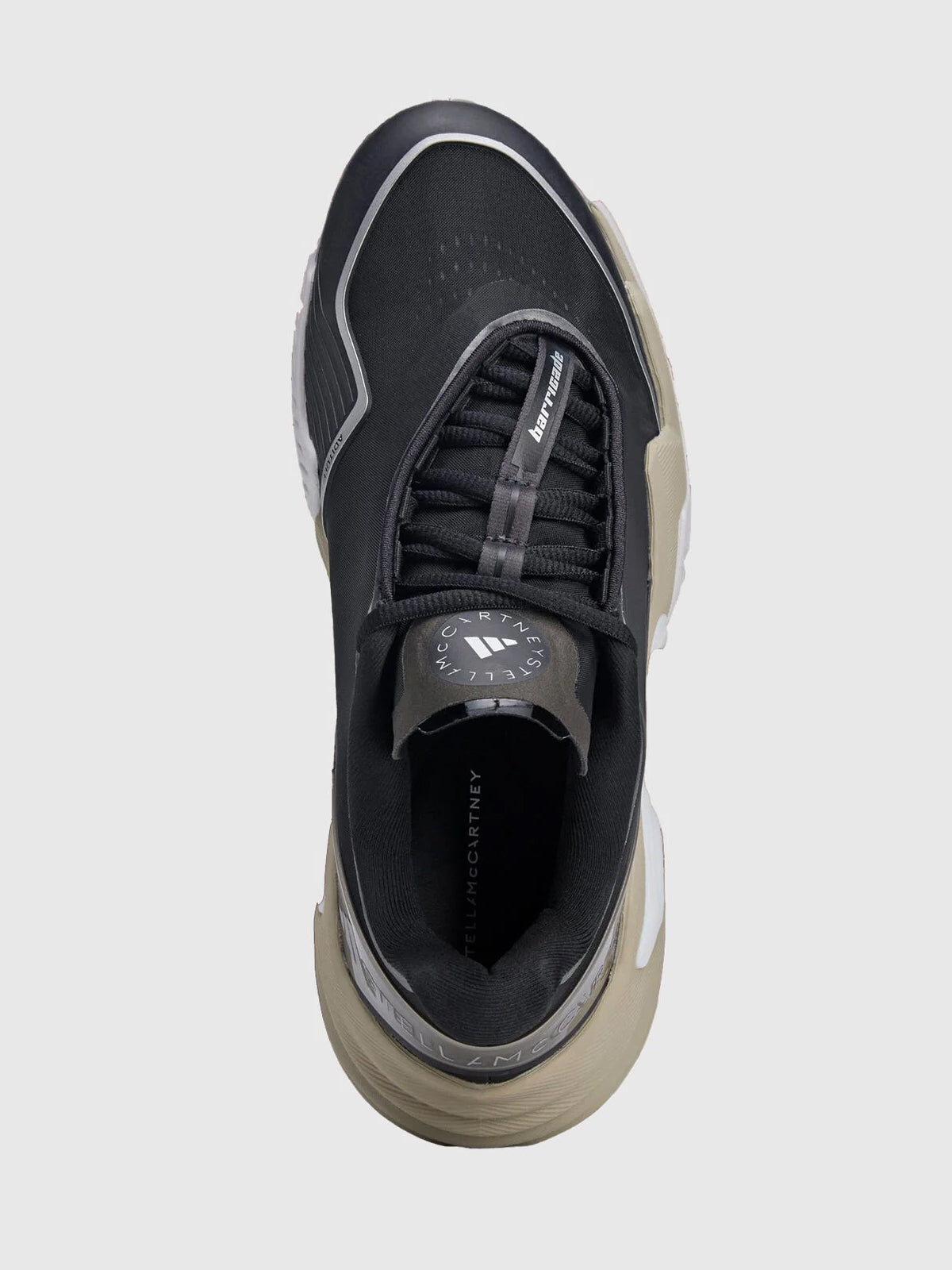 Core Black, Almond Milk and Metallic Silver Barricade Tennis Shoes