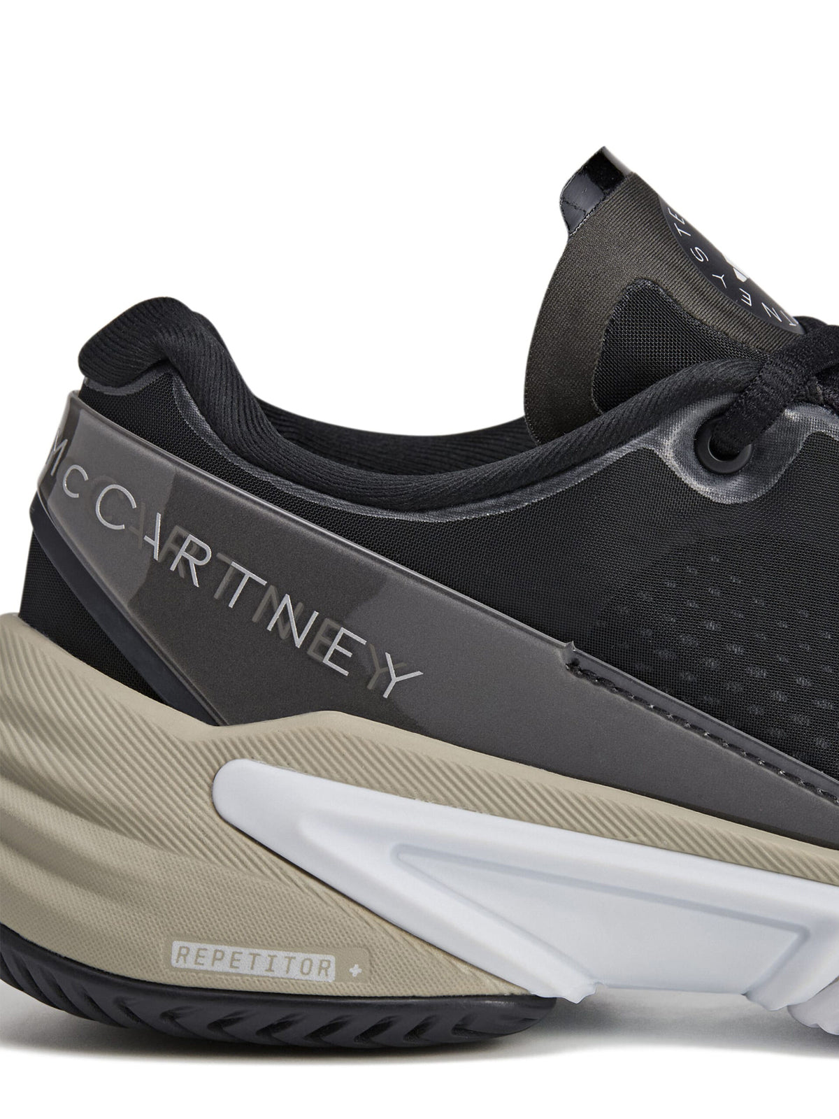Core Black, Almond Milk and Metallic Silver Barricade Tennis Shoes