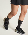 Core Black, Almond Milk and Metallic Silver Barricade Tennis Shoes