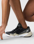 Core Black, Almond Milk and Metallic Silver Barricade Tennis Shoes
